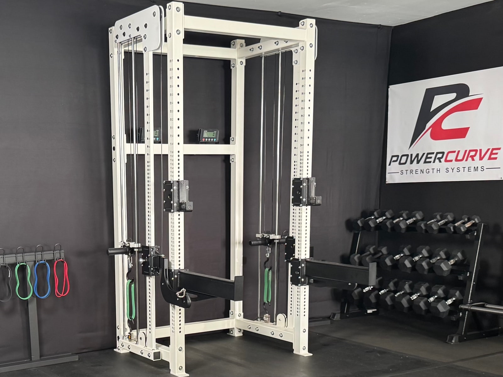 PowerCurve rack with visible band attachments, cable routing, and two load displays